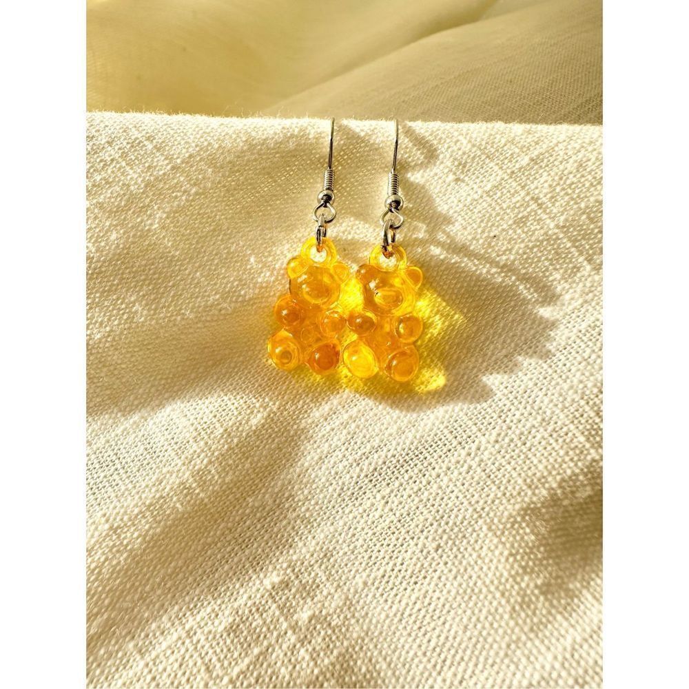 Golden acrylic gummy bear dangly earrings